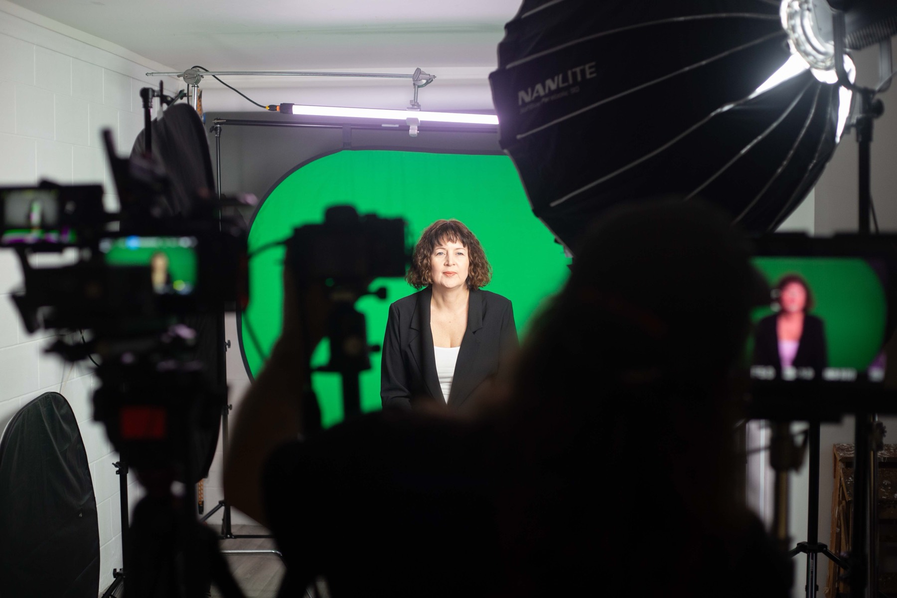 Belinda on set building a content system